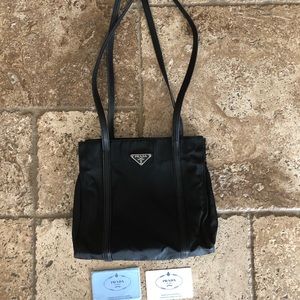 Authentic Prada compact bag with authenticity card